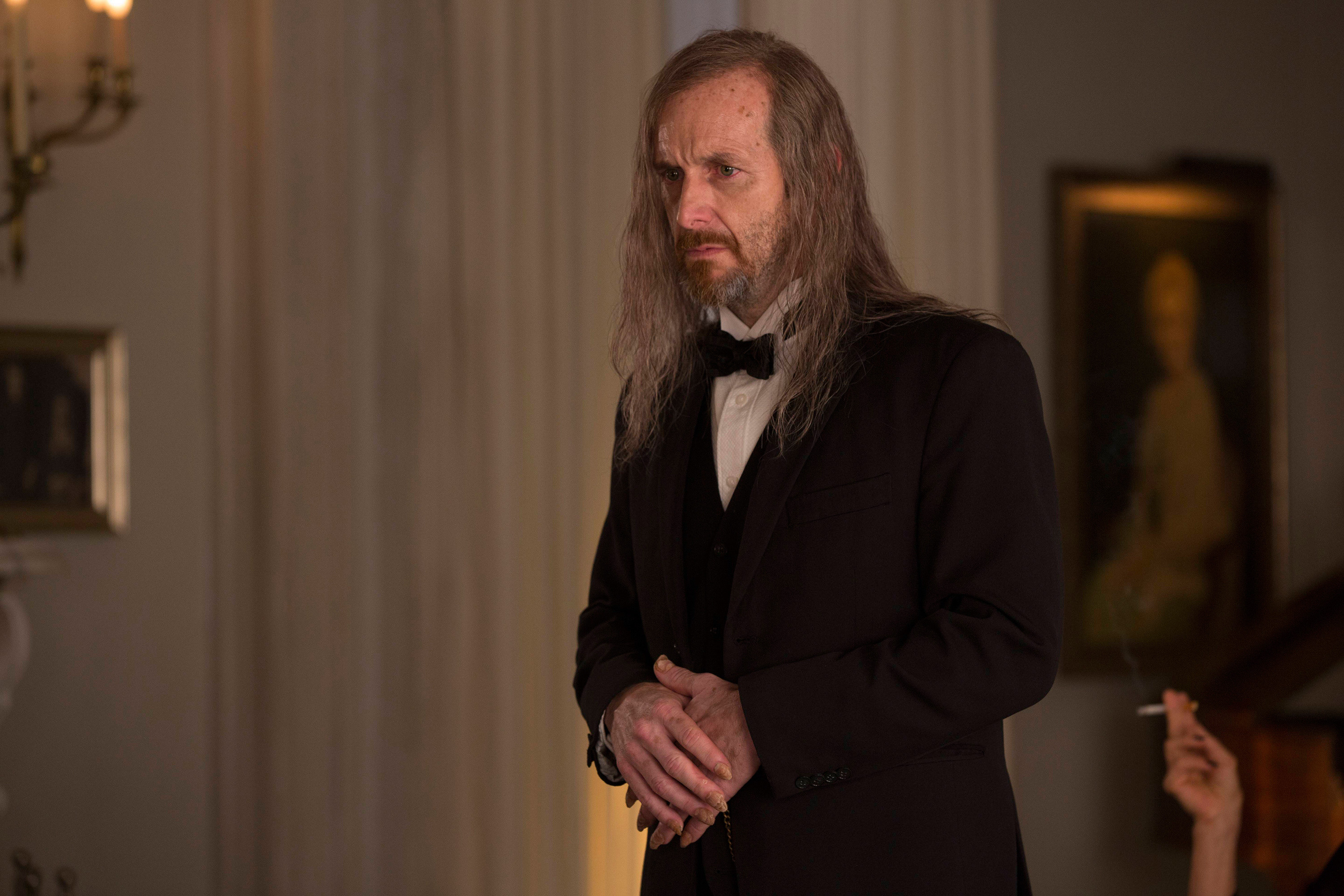 Denis O'Hare in American Horror Story