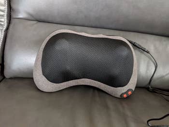 Reviewer's massager placed on couch