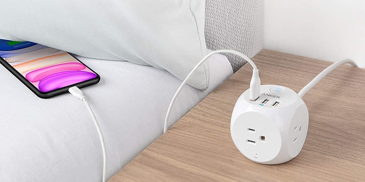 Charging cube with USB charger plugged in