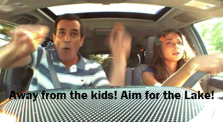 Gif of Phil Dunphy yelling &quot;Away from the kids! Aim for the lake!&quot; while teaching his daughter to drive. 