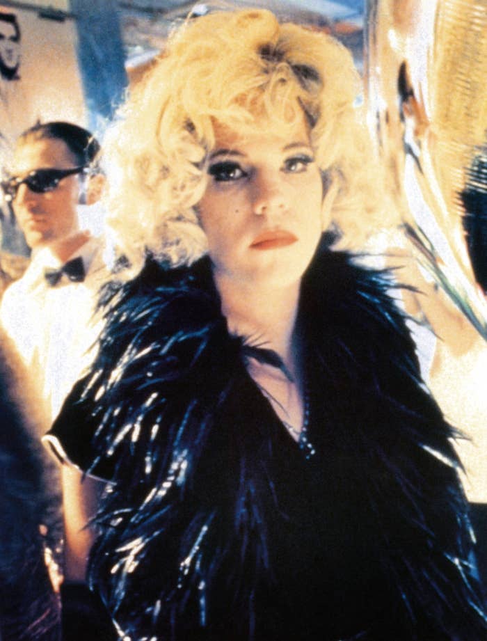 Stephen Dorff in character as Candy Darling in a feather scarf