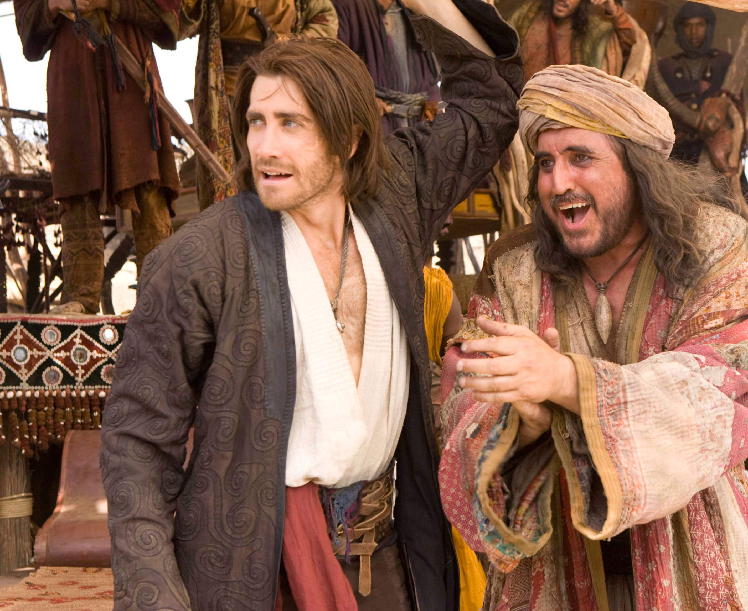 Jake Gyllenhaal&#x27;s character Dastan stands next to Alfred Molina, who plays Sheik Amar