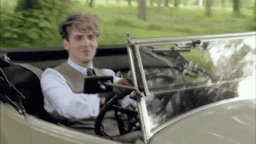 Matthew driving a car in &quot;Downton Abbey&quot;, and he&#x27;s about to be hit by a milk truck