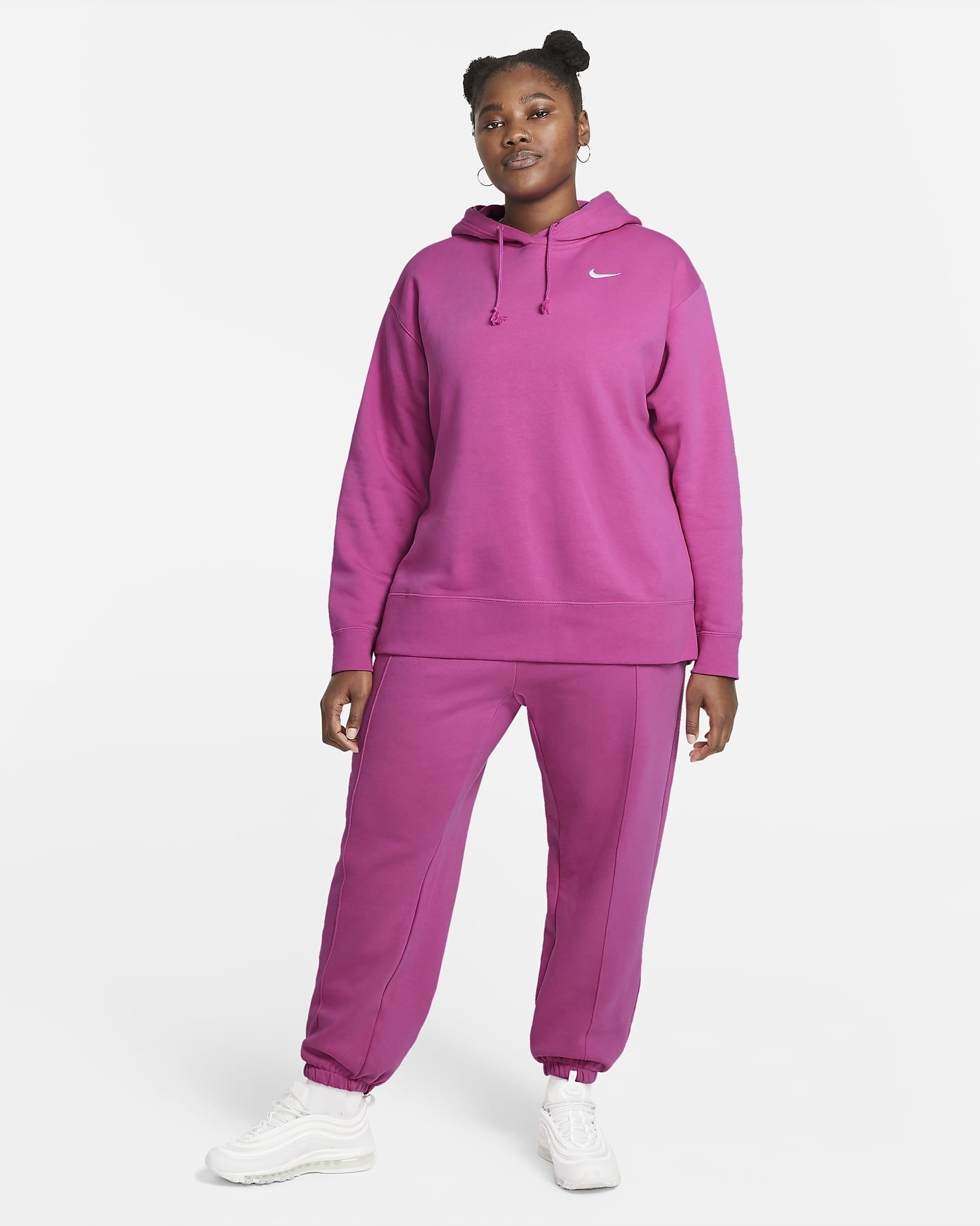 A person wearing a matching sweatshirt and sweatpants