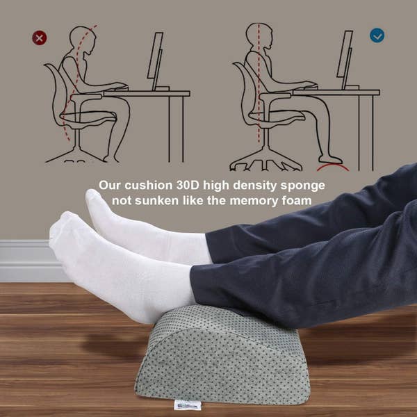 A person with their feet resting on the cushion