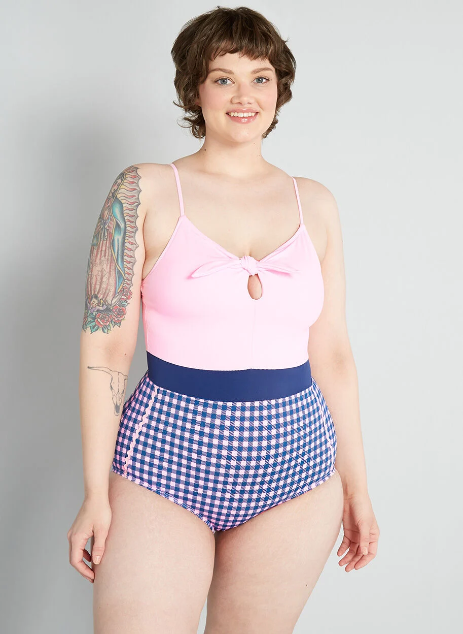 one piece with pink top and blue gingham bottom