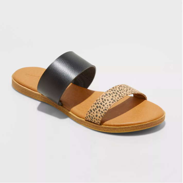 the sandal with a black strap and leopard print strap 
