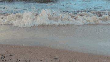 Waves crashing into shore