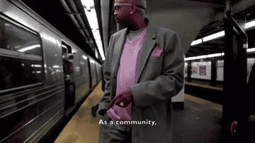 Man getting onto a subway car