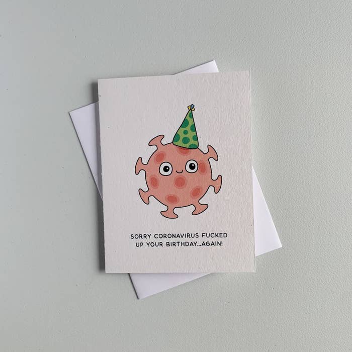 a card with a virus drawing that says sorry coronavirus fucked up your birthday again