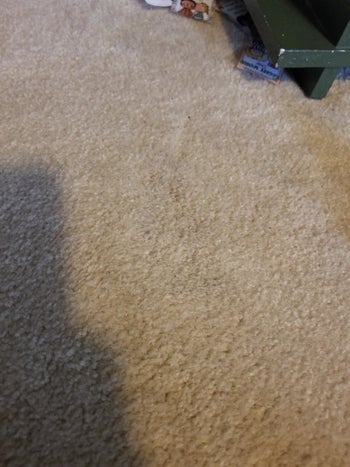 Beige carpet after using the spray, showing how the stain is now gone