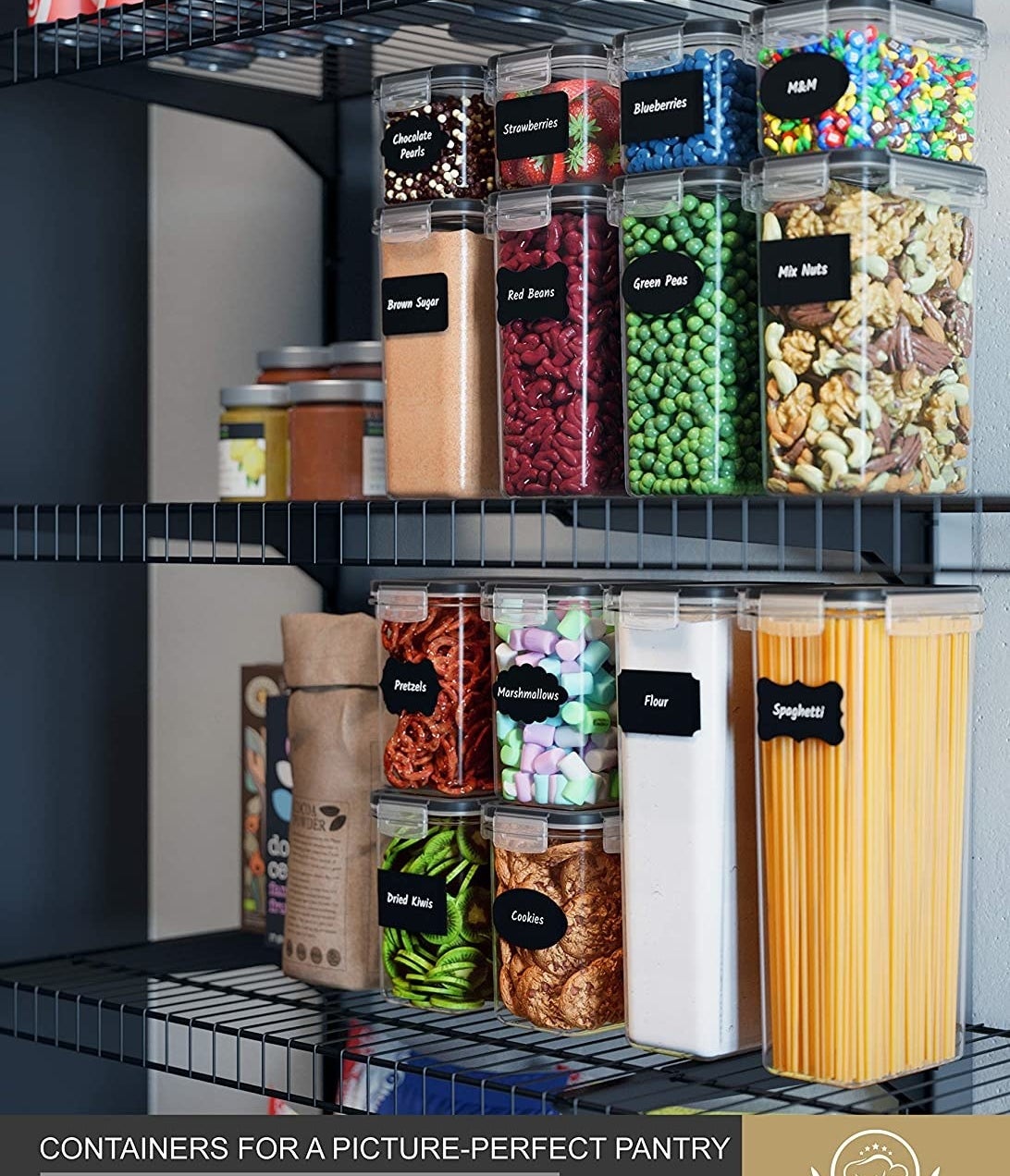 A set of plastic food containers with chalkboard labels arranged neatly on a pantry shelf