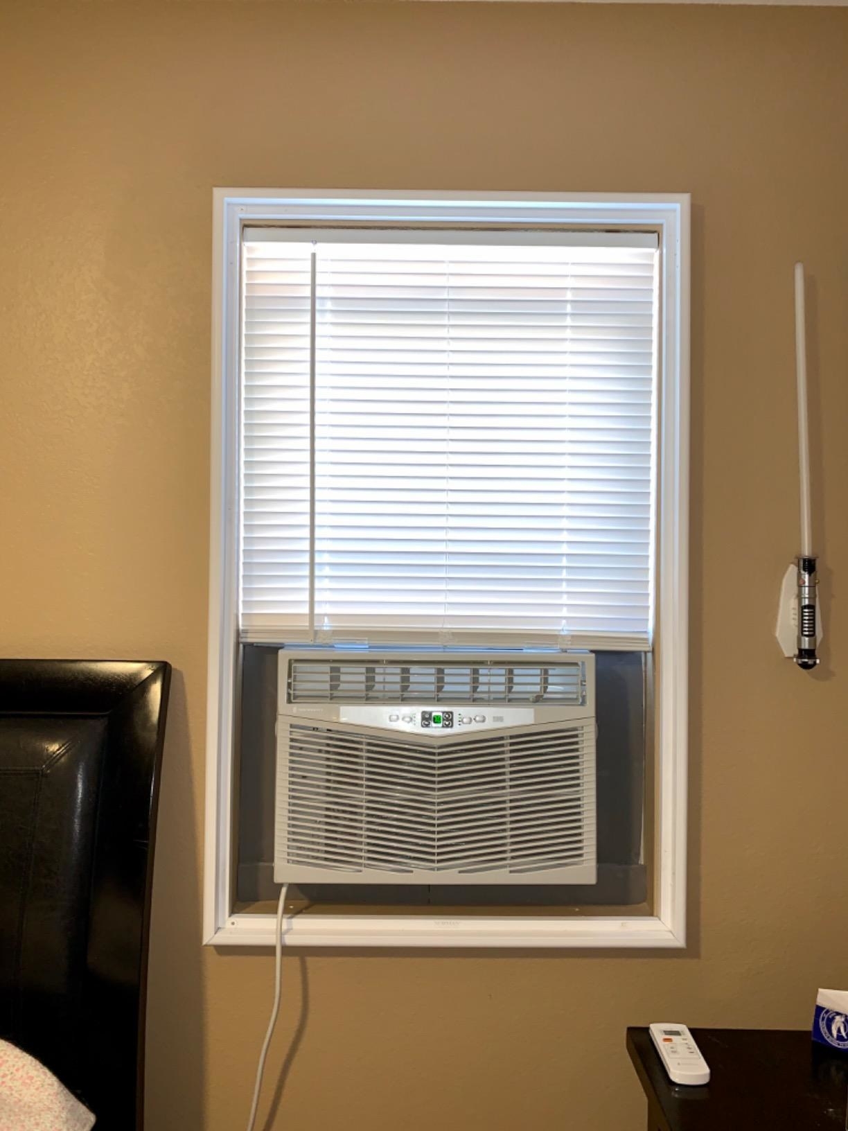 reviewer image of the TaoTronics air conditioner installed in a window