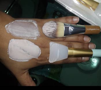 different reviewer comparing regular brush with silicone brush. the silicone brush shows much more mask applied to skin.