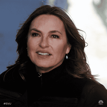 Gif of Olivia Benson from Law and Order: SVU smiling and nodding her head