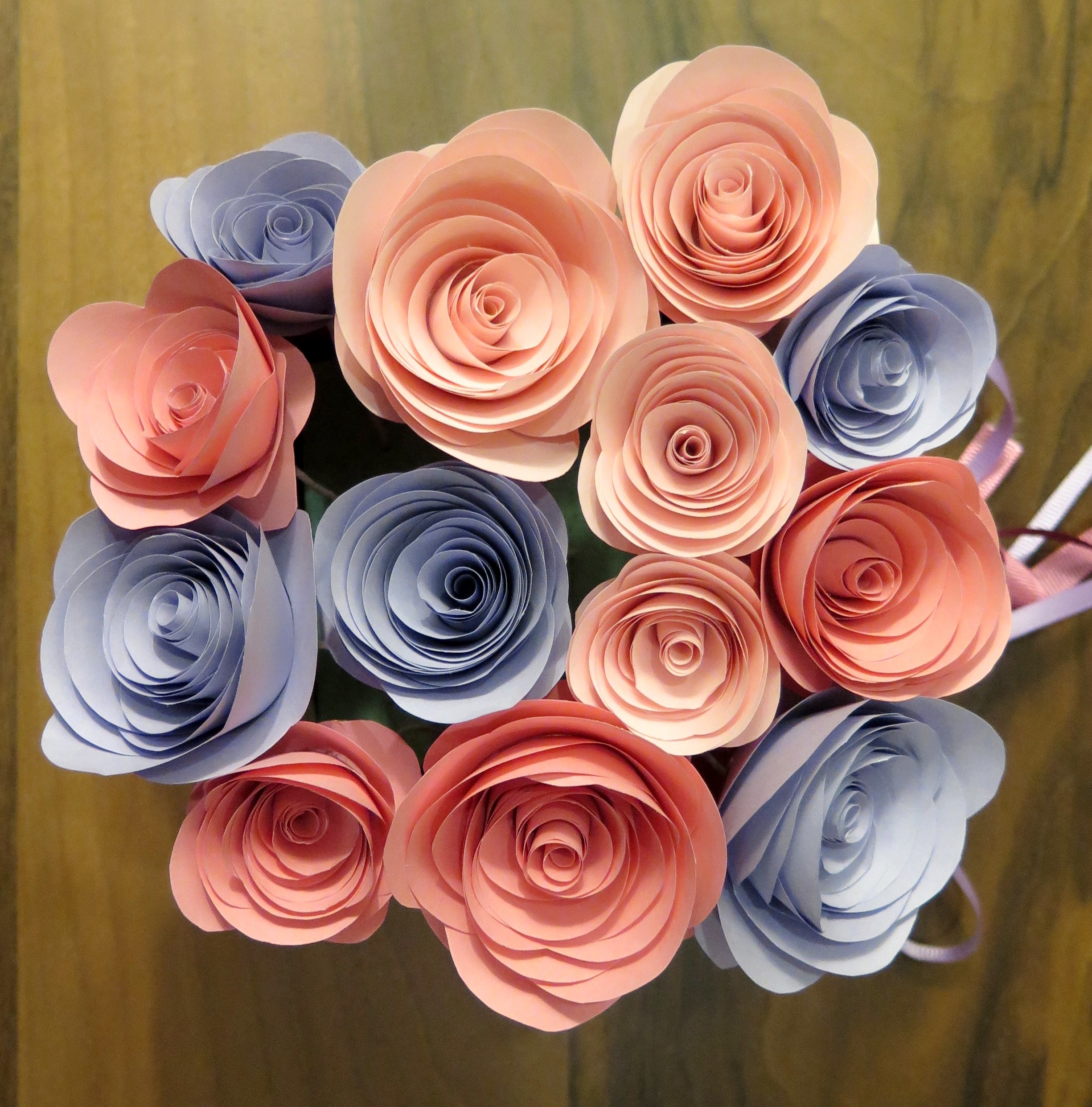 Pink and purple paper roses in a bouquet