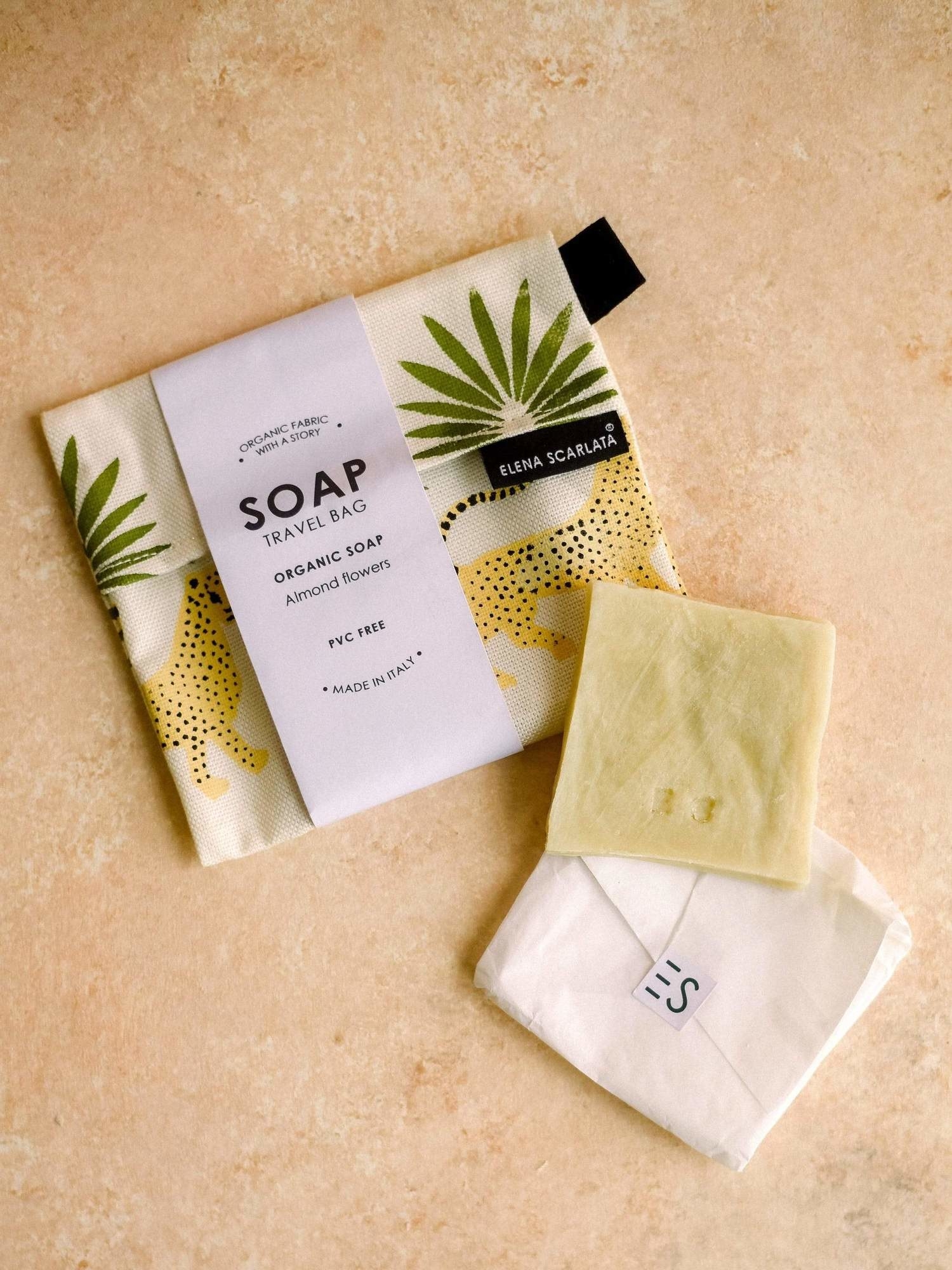 square bar of soap with a pouch with leopard and leaves