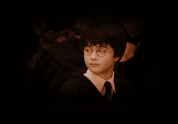 GIF of Harry Potter rolling his eyes