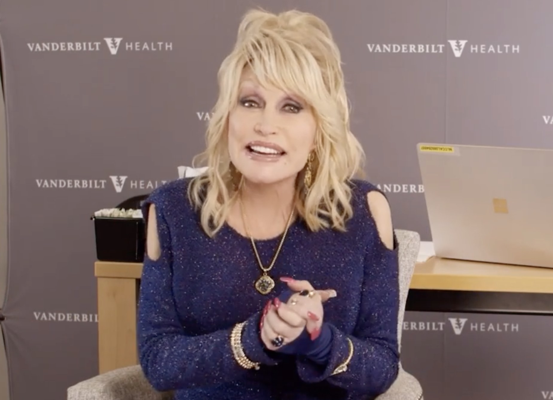 Dolly talks about the vaccine before getting her first dose