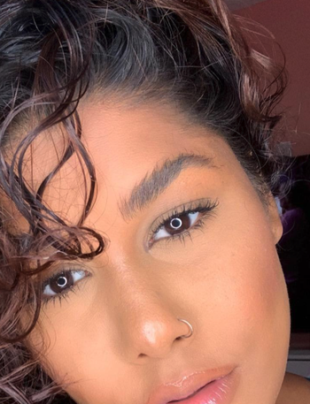 closeup of different reviewer's eyebrows that appear fluffy and full