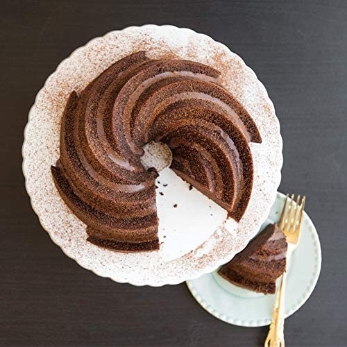 top look down at a swirl bundt cake on a cake stand