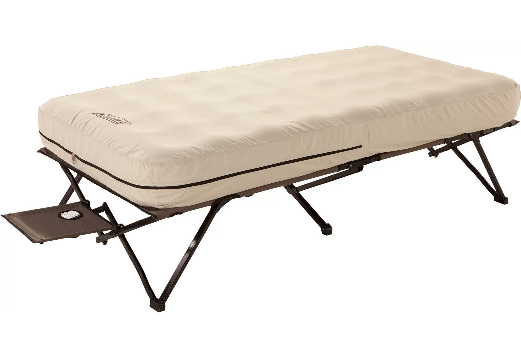 The cot with blown up airbed and side tray