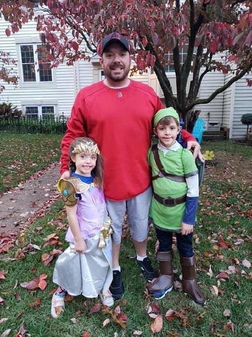 William "Billy" Evans is shown with his son and daughter on Halloween