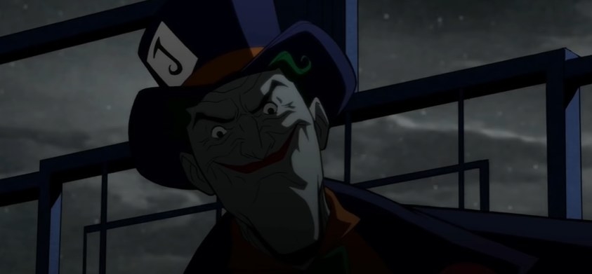 Joker smiling with a purple top hat on