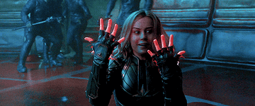 Carol Danvers clapping her hands and being excited