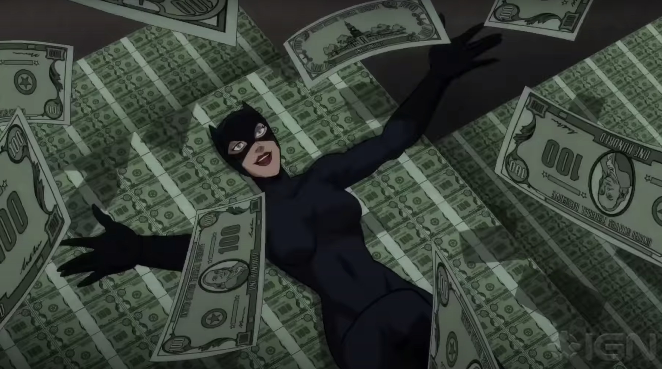 Catwoman lays in a pile of money