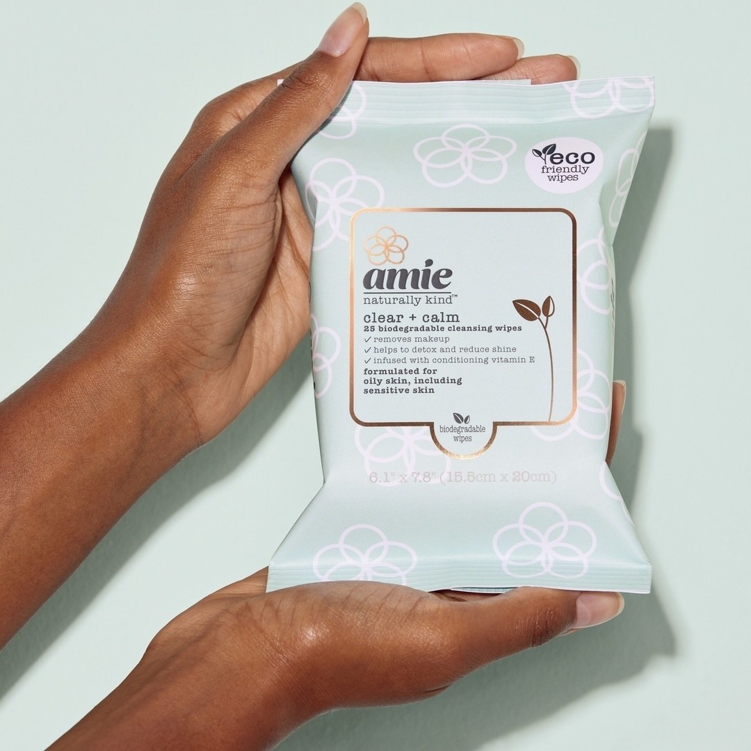 Hands holding Amie face wipes
