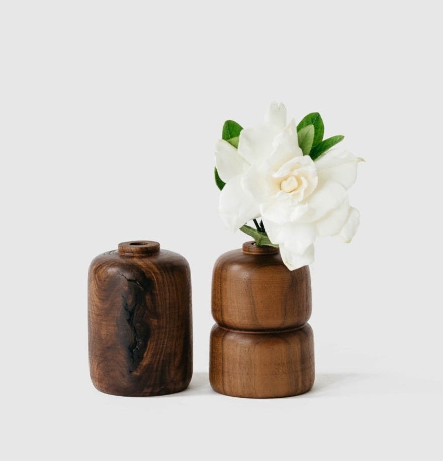 the two wooden vases