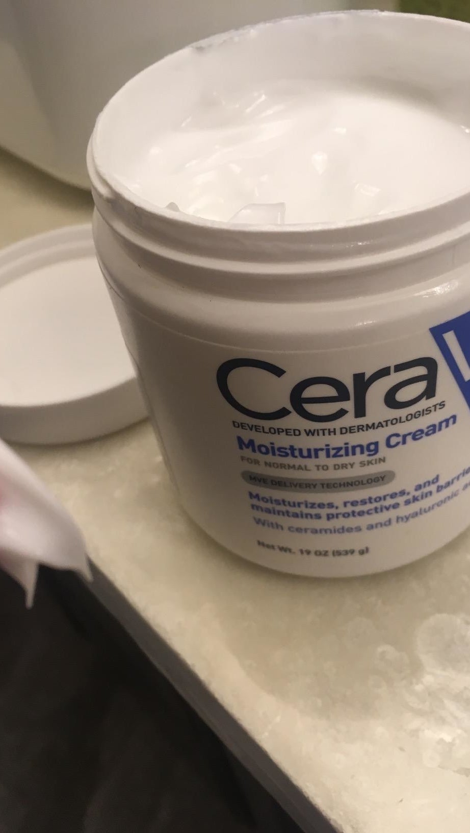 A tub of the moisturizer, which you scoop out with your finger