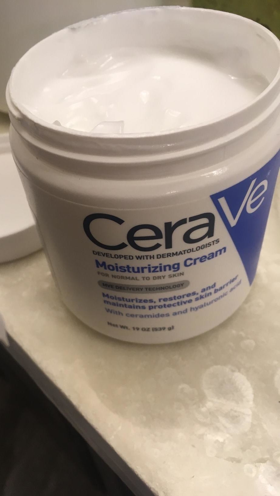 A tub of the moisturizer, which you scoop out with your finger