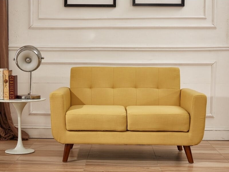 The loveseat in the color Naples Yellow