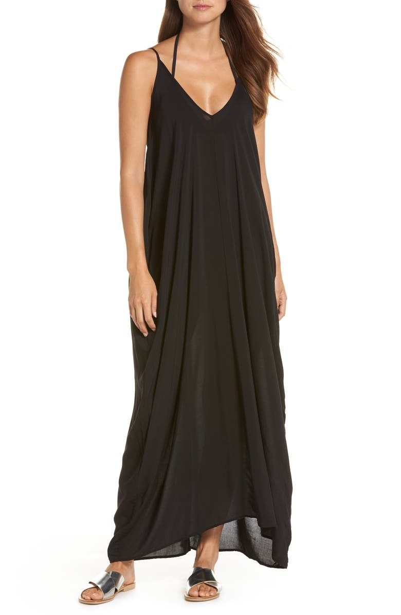 A model wears the black maxi dress
