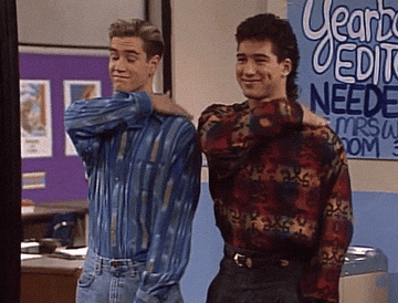 A gif of Zach and Screech from saved by the bell patting themselves on the back