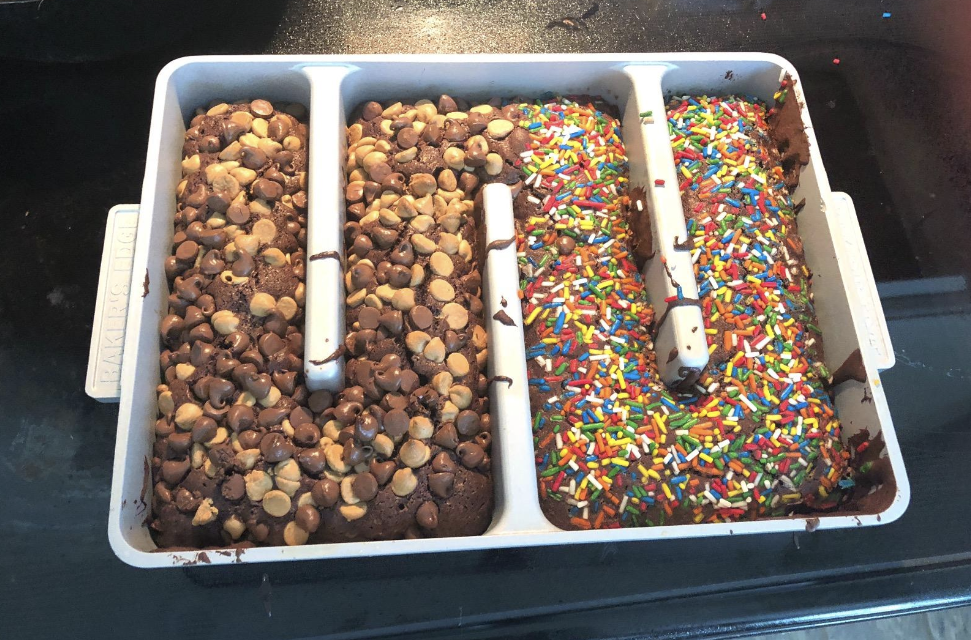 reviewer photo of a brownie with two different toppings baked in the pan