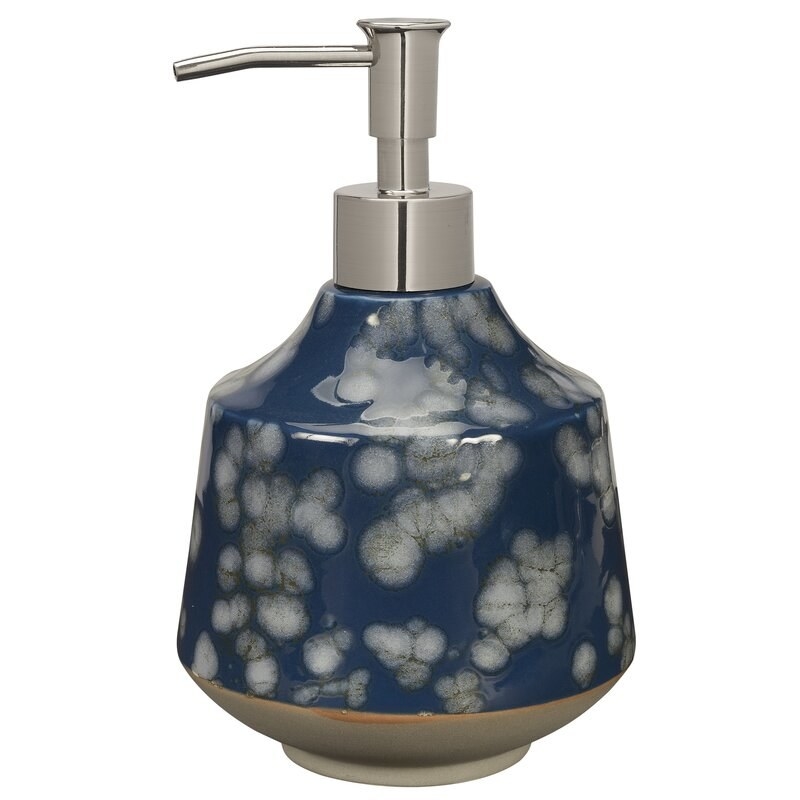 The blue and white soap dispenser