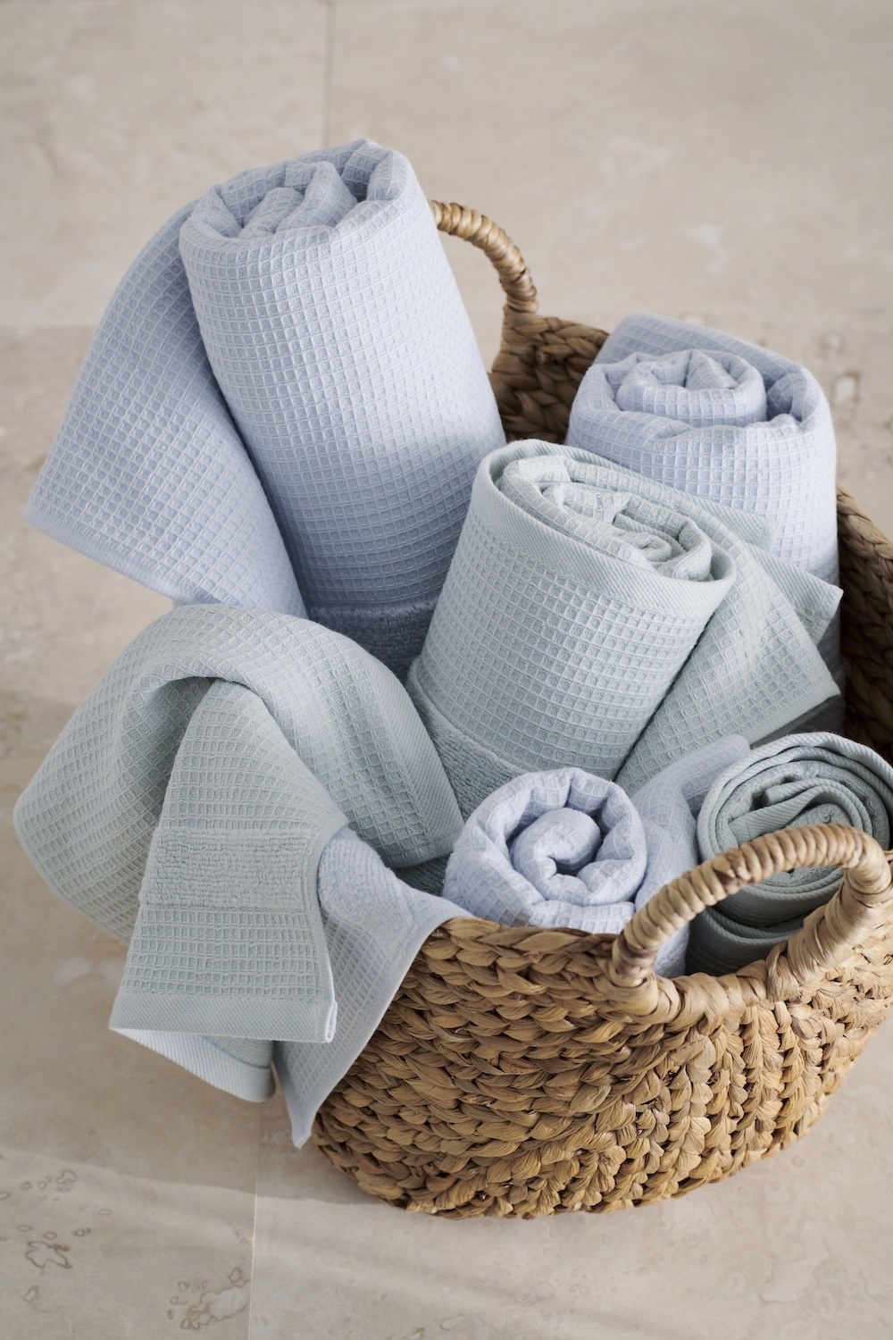 A basket of blue waffle towels
