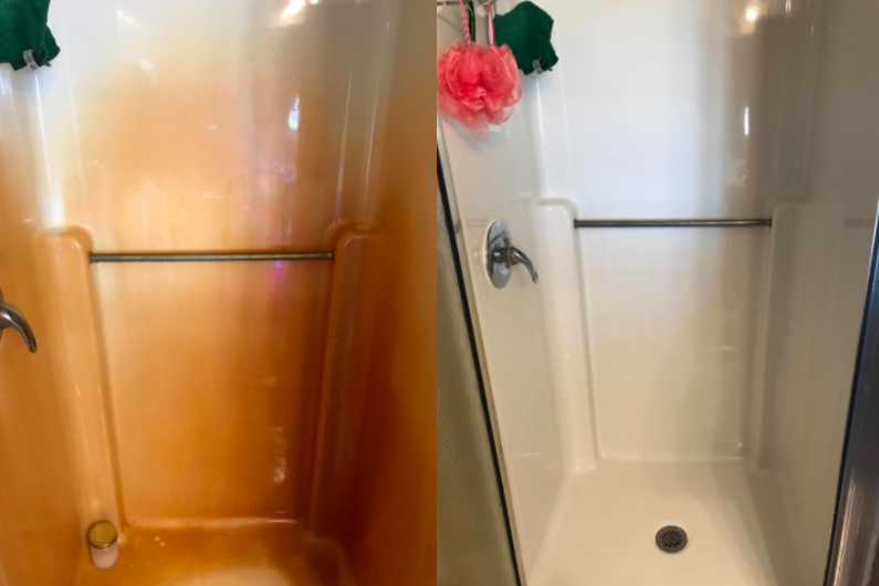A customer review photo showing the results of the rust remover on their shower