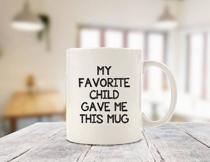 white mug that reads &quot;my favorite child gave me this mug&quot;