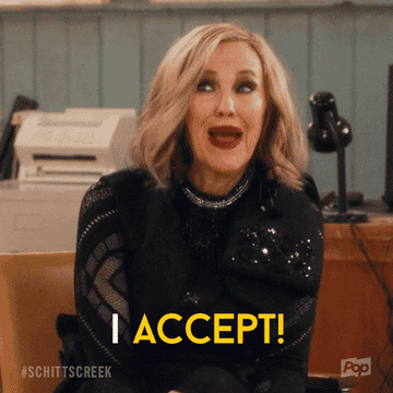 gif of Catherine O&#x27;Hara in the TV show &quot;Schitt&#x27;s Creek&quot; saying &quot;I Accept!&quot;