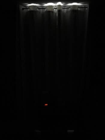 reviewer image of a room darkened by nicetown blackout curtains