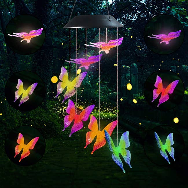 Six LED butterflies in different bright colors handing in a tiered circle from the base of a hanging wind chime 