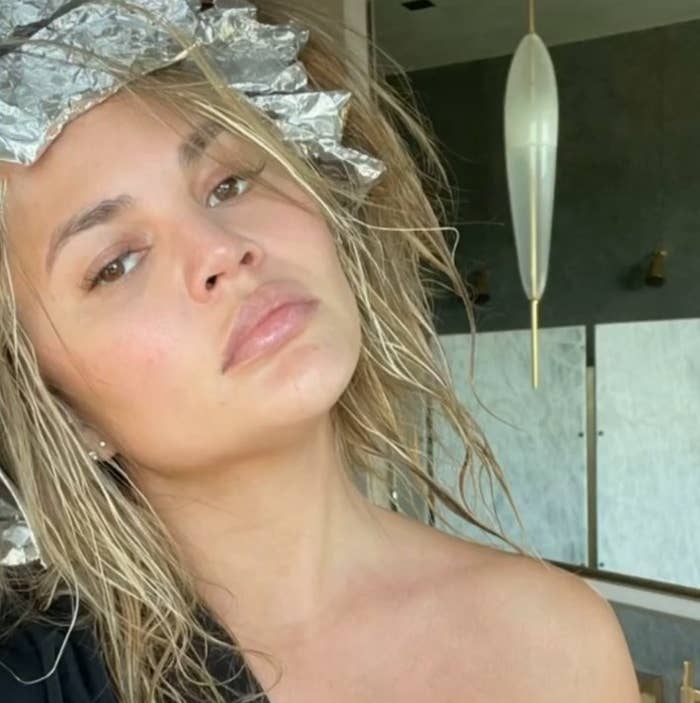 Chrissy with wet hair with foils in it 