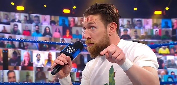 Daniel Bryan pointing his finger while on a WWE microphone