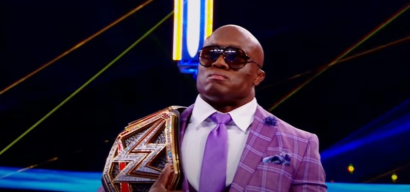Bobby Lashley with WWE title around his shoulder