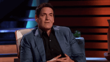 Mark Cuban from Shark Tank claps his hands and compliments an entrepreneur during their pitch