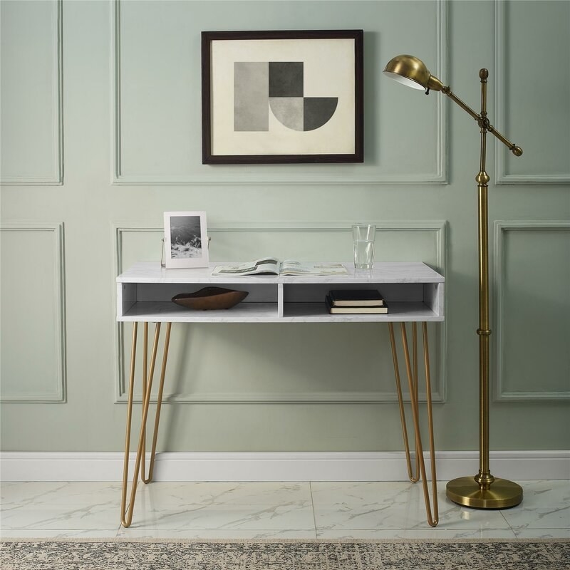 faux white marble desk with gold metal hairpin legs